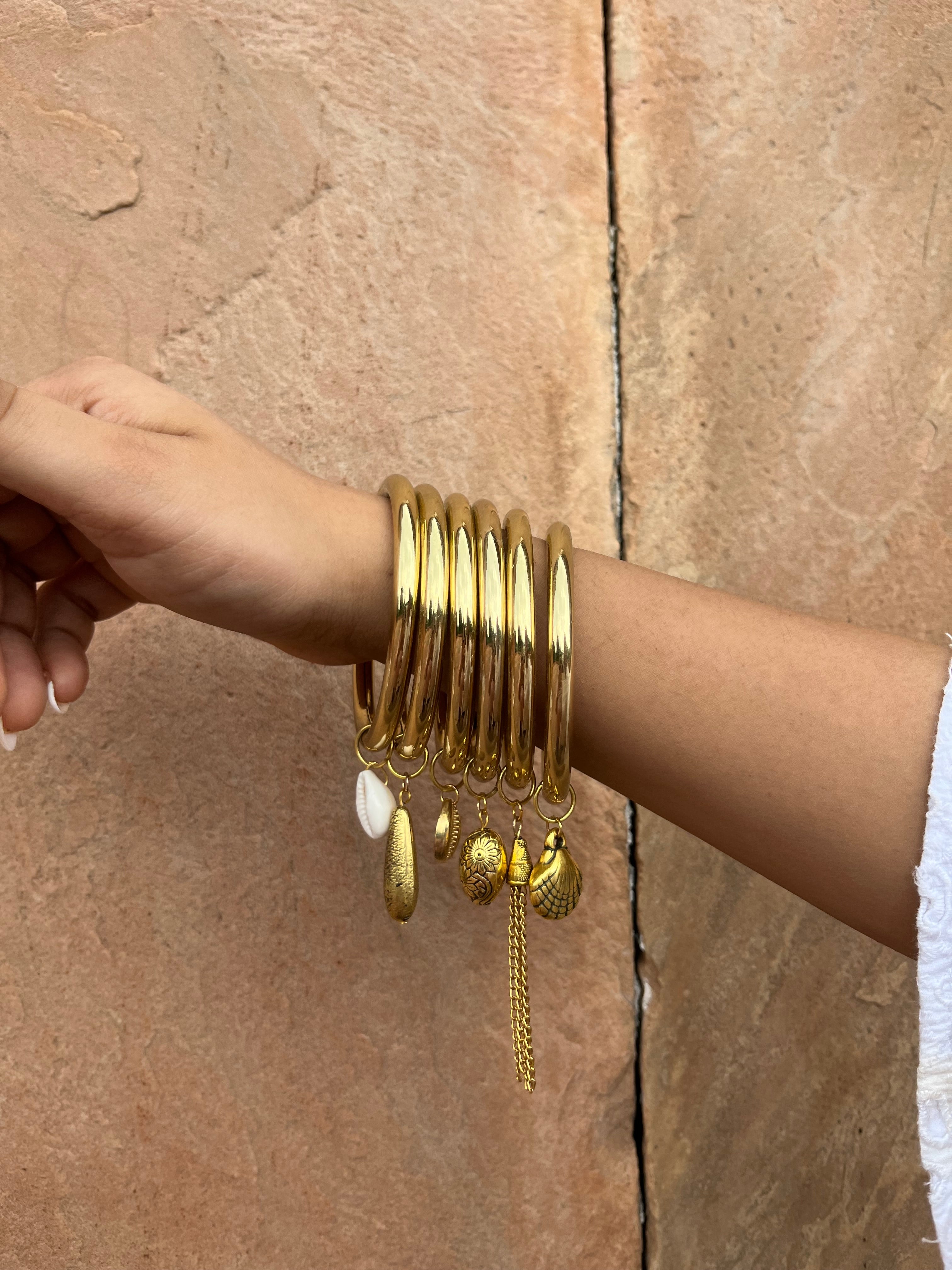 Brass charms bangle stack